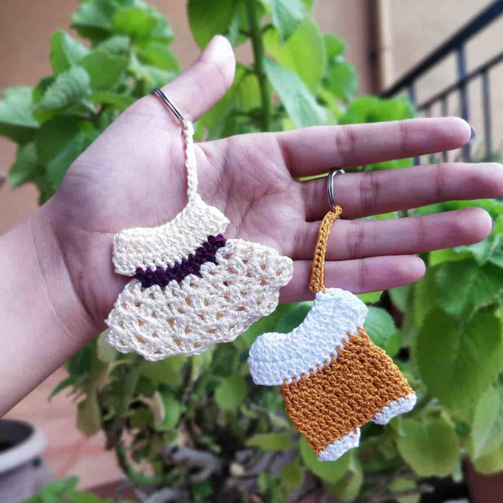 crochet dress keychain Handmade with love These adorable crochet dress keyrings are the perfect little accessory to add a cute touch to your keys or bag #crochet #crochetkeychain #handmade #smallbusinessuk #crochetlove